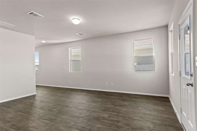 160 Lavender Ln, Elgin, TX 78621 - empty room with baseboards and dark wood-type flooring