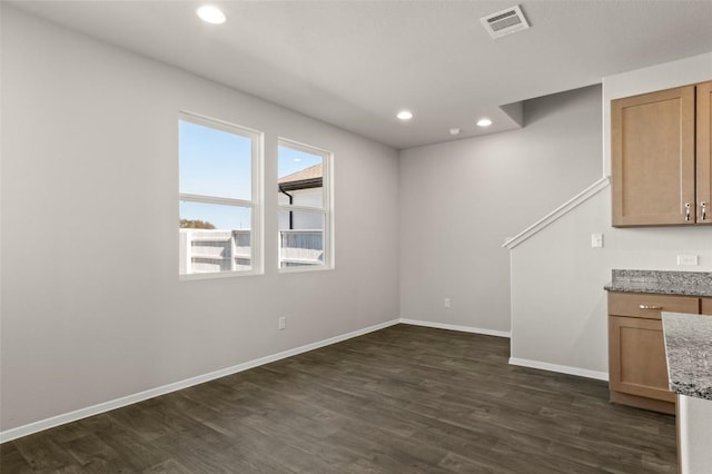 160 Lavender Ln, Elgin, TX 78621 - unfurnished dining area with dark wood-type flooring, recessed lighting, and baseboards
