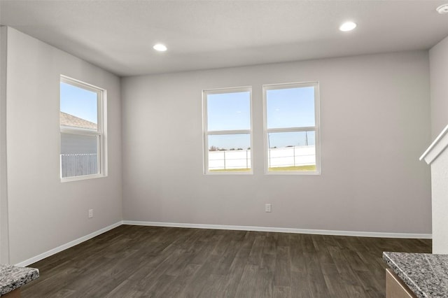 160 Lavender Ln, Elgin, TX 78621 - unfurnished room with dark wood-type flooring, baseboards, recessed lighting, and a smoke detector