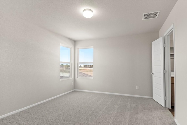 160 Lavender Ln, Elgin, TX 78621 - unfurnished bedroom featuring carpet flooring and baseboards