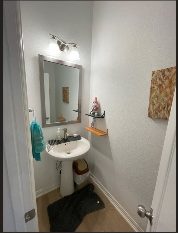 bathroom featuring sink and tile patterned flooring