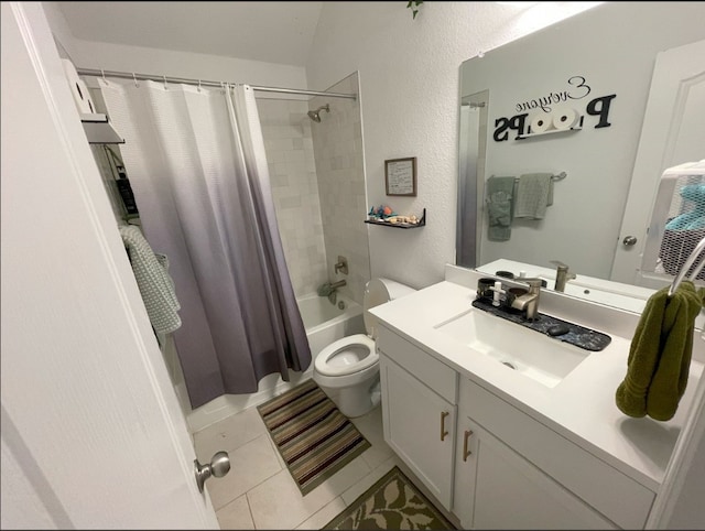 full bathroom with vanity, toilet, tile patterned floors, and shower / tub combo