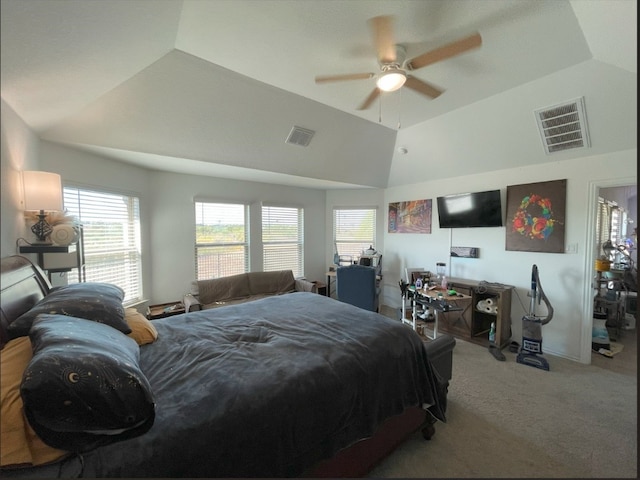 carpeted bedroom featuring lofted ceiling and ceiling fan