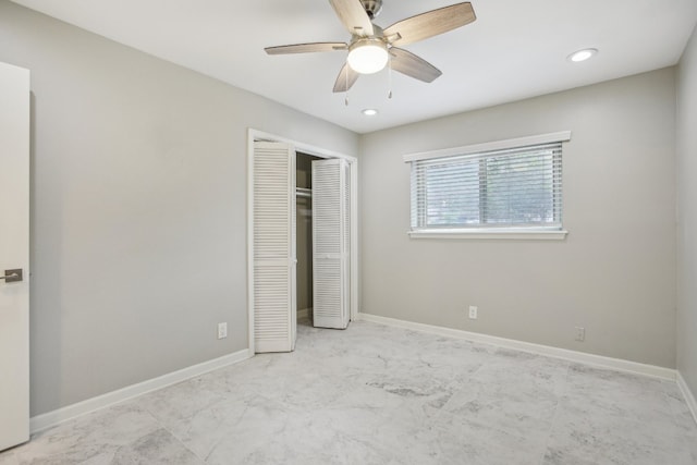 unfurnished bedroom featuring a closet and ceiling fan