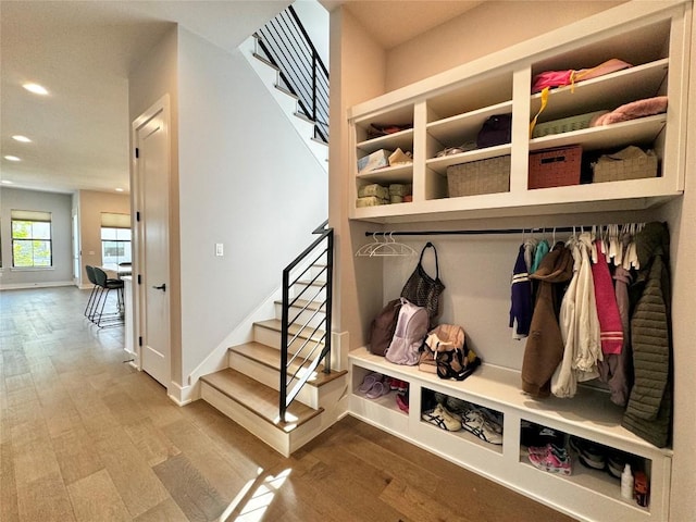 mudroom with hardwood / wood-style floors