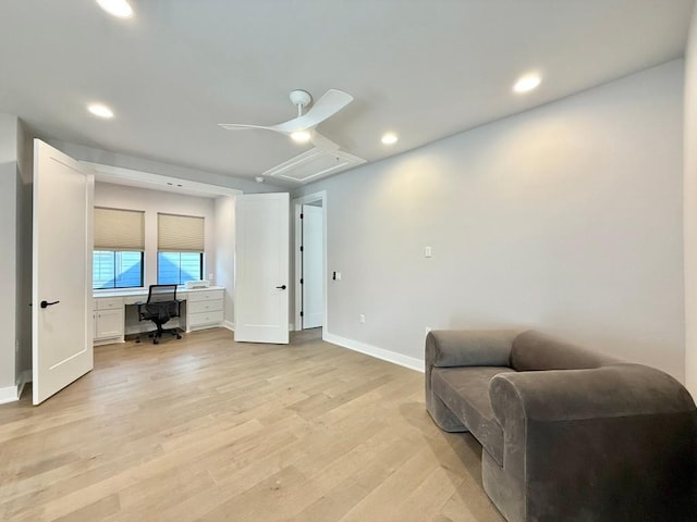 sitting room with light hardwood / wood-style floors