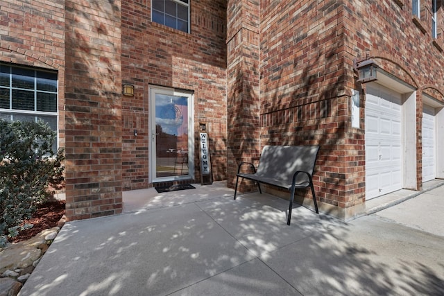 property entrance with a garage