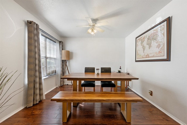 dining room featuring ceiling fan and dark hardwood / wood-style flooring