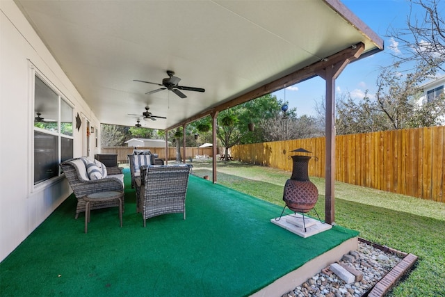 view of patio featuring ceiling fan