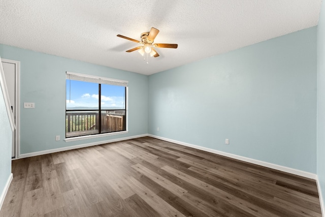 unfurnished room with ceiling fan, a textured ceiling, and light hardwood / wood-style flooring