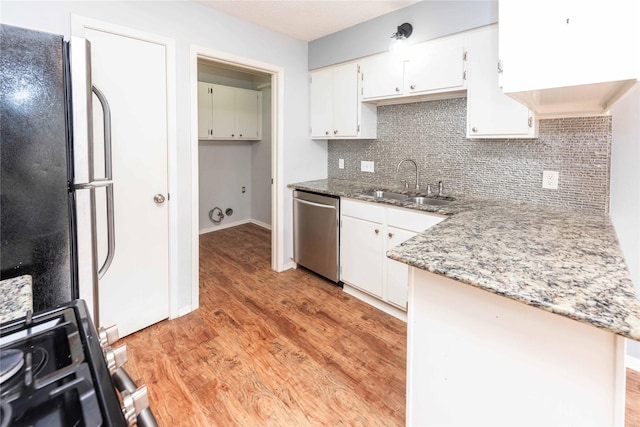 kitchen featuring sink, white cabinets, kitchen peninsula, and dishwasher