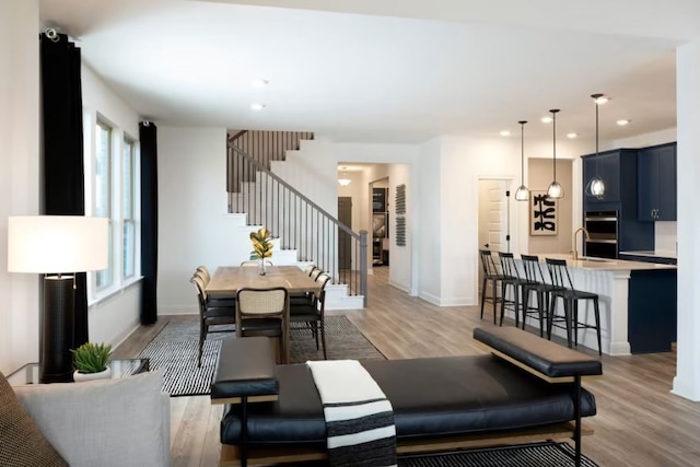 living room with light hardwood / wood-style floors