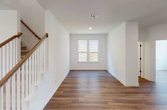 interior space with dark hardwood / wood-style flooring