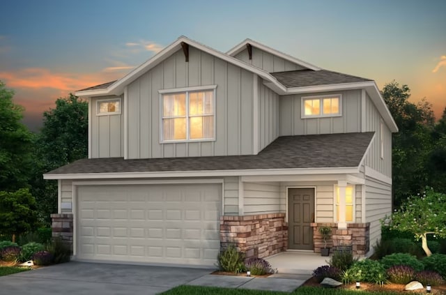 view of front of property featuring a garage