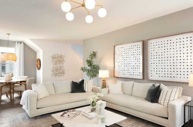 living room with a notable chandelier and hardwood / wood-style floors