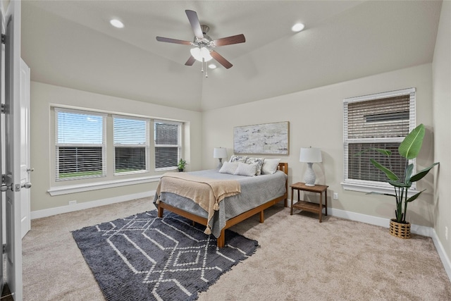 carpeted bedroom featuring vaulted ceiling and ceiling fan