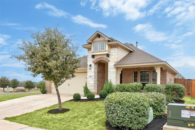 view of front facade featuring a garage and a front lawn