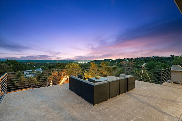 view of patio featuring outdoor lounge area and a balcony