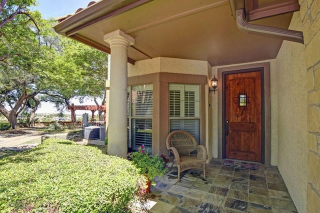 7800 SW Pkwy Unit 510, Austin, TX 78735 - property entrance featuring stucco siding and central AC unit