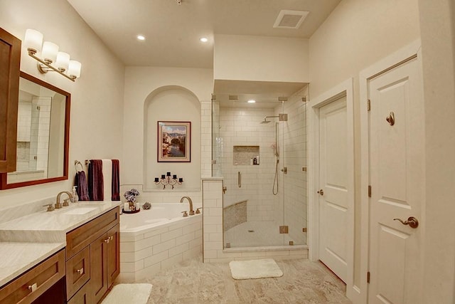 7800 SW Pkwy Unit 510, Austin, TX 78735 - bathroom with a bath, a stall shower, vanity, and recessed lighting