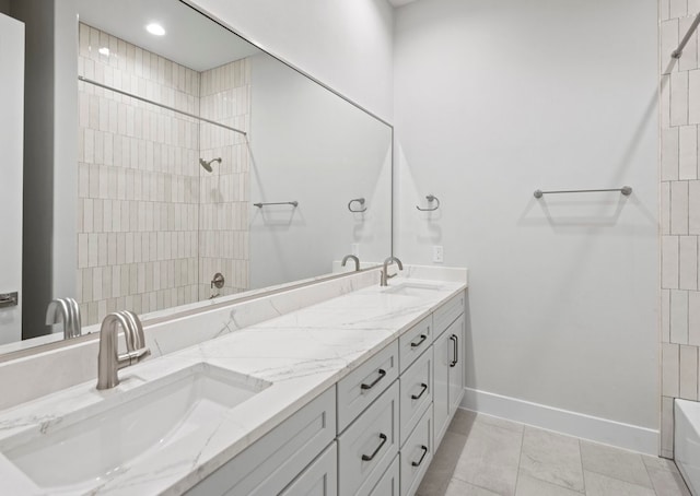 bathroom with vanity and tile patterned flooring