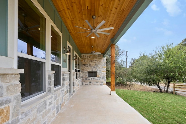 view of patio / terrace featuring ceiling fan