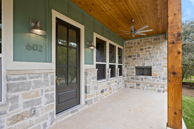 view of patio featuring ceiling fan