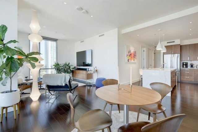 dining room featuring dark hardwood / wood-style floors