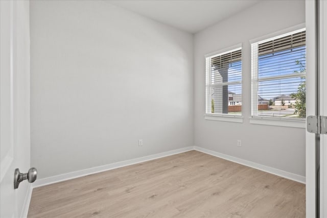 empty room with light wood-type flooring