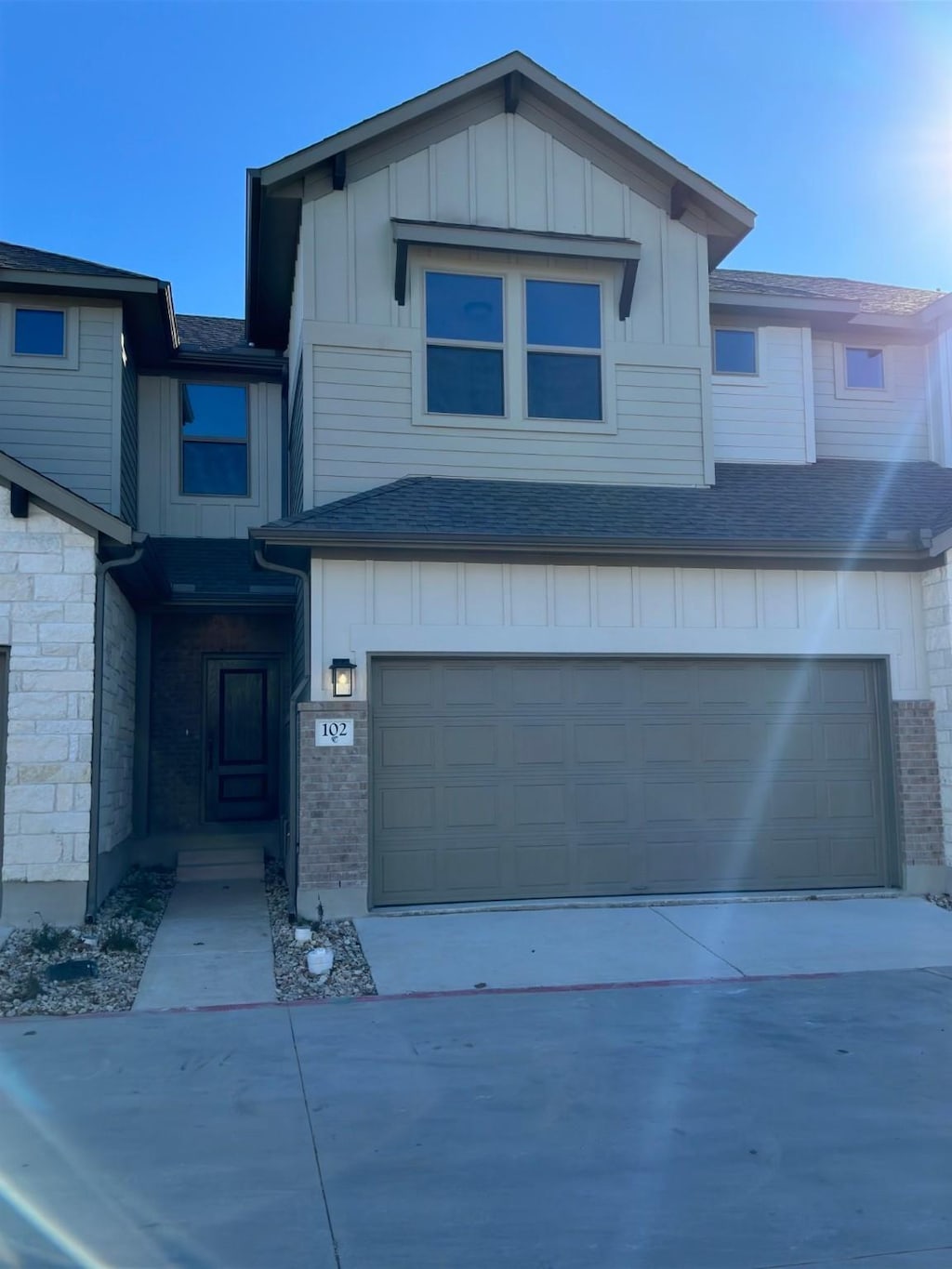 view of front of property featuring a garage