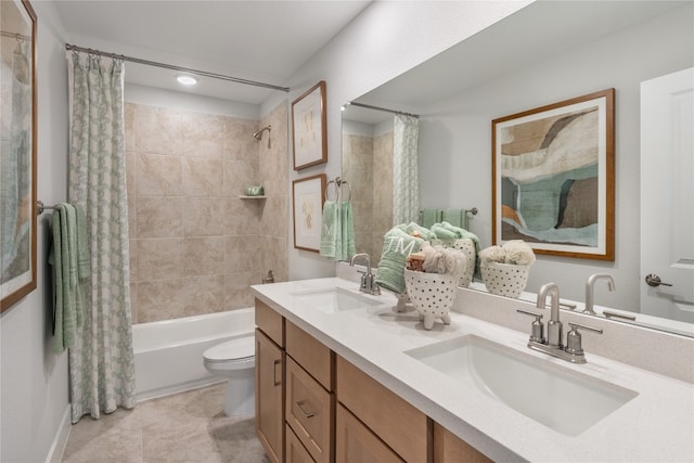 full bathroom with vanity, toilet, tile patterned floors, and shower / bath combo