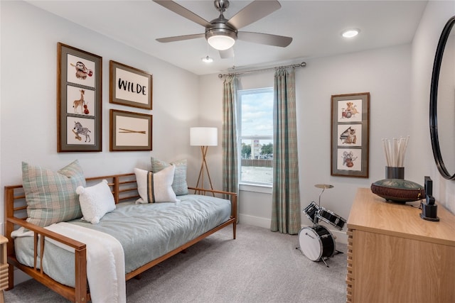 bedroom with ceiling fan and carpet floors