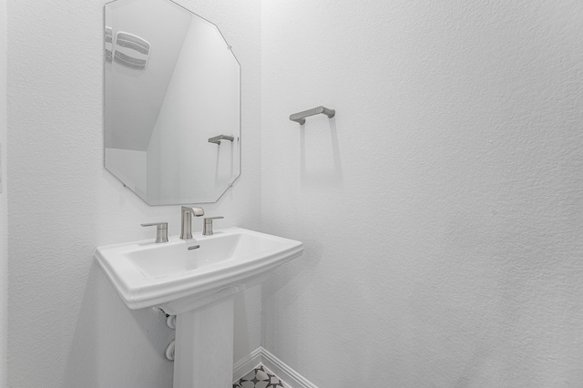bathroom featuring baseboards
