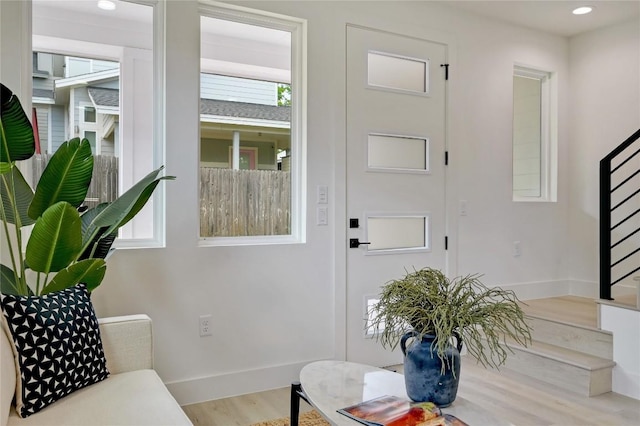 entrance foyer with light hardwood / wood-style floors