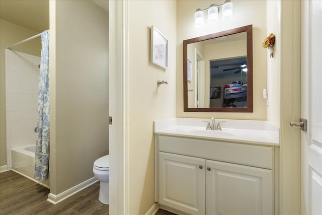 full bathroom with vanity, toilet, wood-type flooring, and shower / bathtub combination with curtain