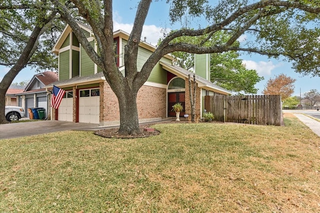 view of front facade with a front lawn and a garage