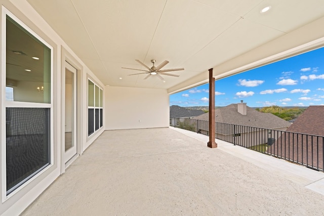 view of patio / terrace featuring a balcony and ceiling fan