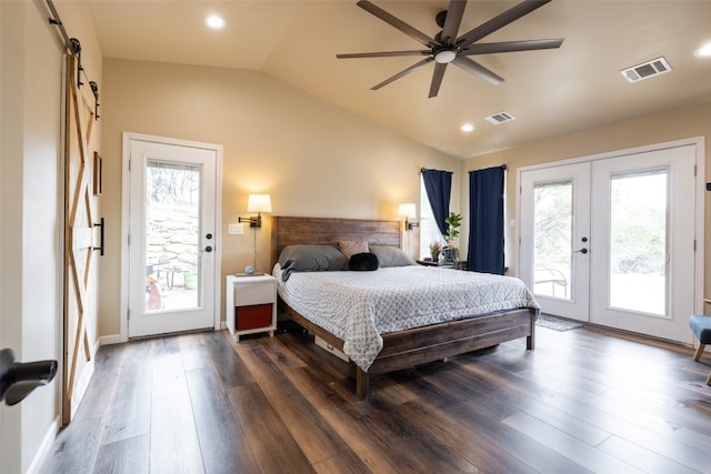 bedroom with french doors, access to exterior, dark wood-type flooring, a barn door, and ceiling fan