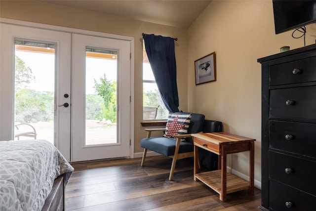 bedroom with french doors, access to exterior, and dark hardwood / wood-style flooring