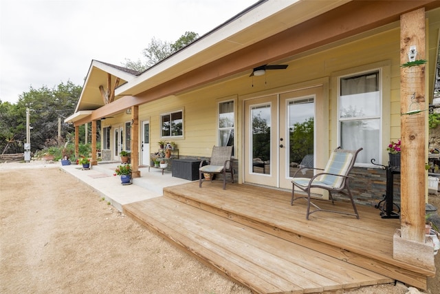 deck featuring a patio area and ceiling fan