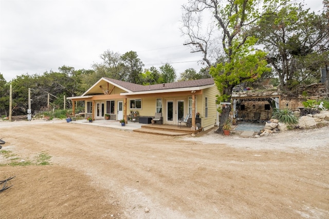 back of house with french doors