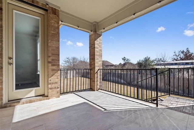 view of patio / terrace with a balcony