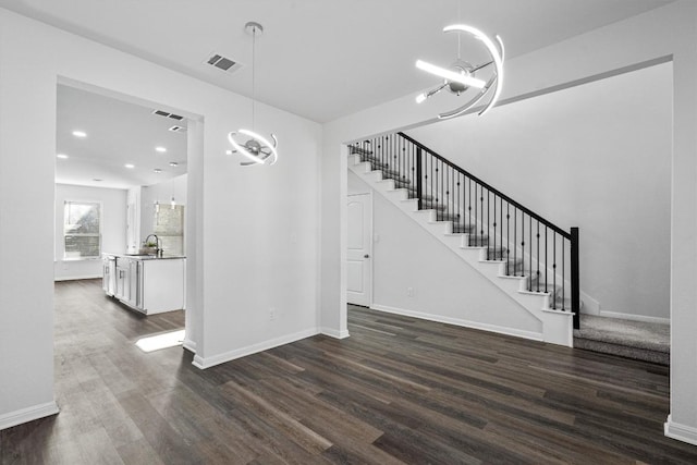 interior space with dark hardwood / wood-style flooring