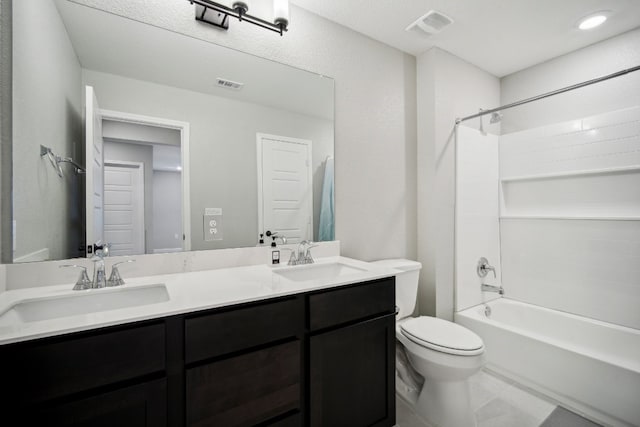 full bathroom with vanity, shower / washtub combination, and toilet