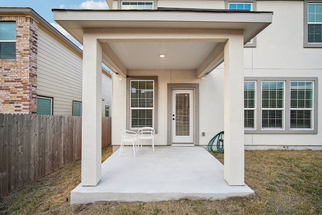 doorway to property featuring a patio area