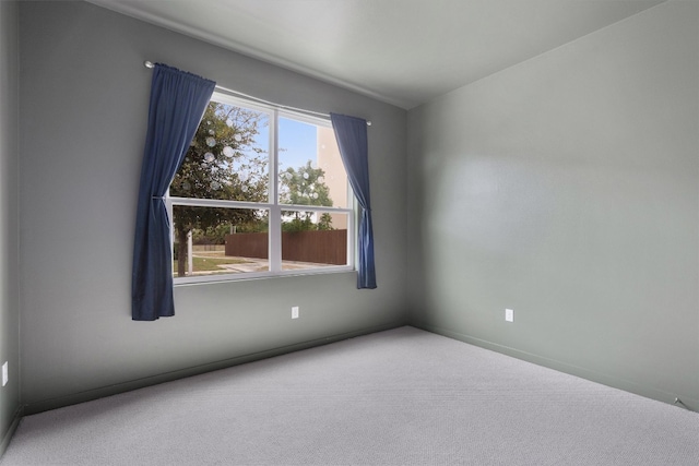 empty room with carpet flooring