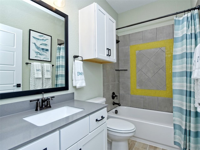 full bathroom with shower / bath combo with shower curtain, vanity, and toilet