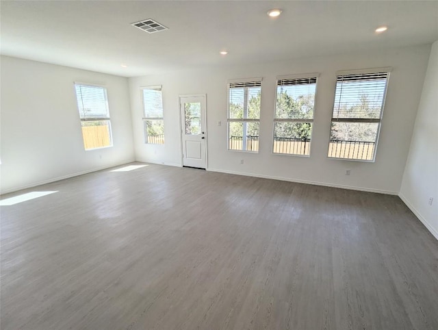 903 Bobby Lou Ln, Copperas Cove, TX 76522 - empty room with wood finished floors, baseboards, and recessed lighting