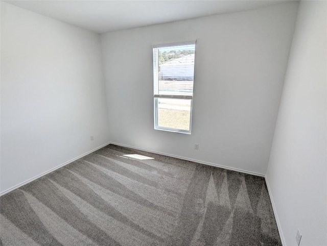 903 Bobby Lou Ln, Copperas Cove, TX 76522 - carpeted empty room featuring baseboards