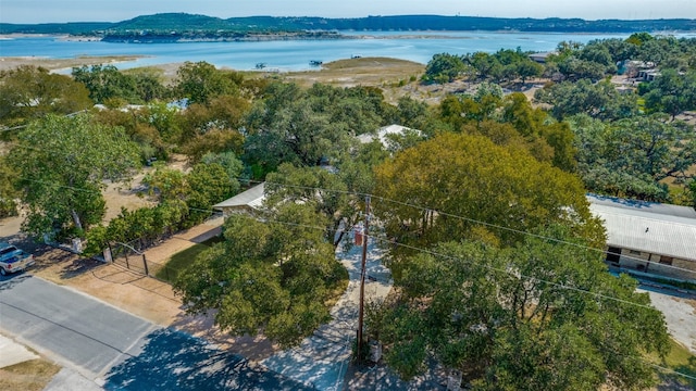 aerial view featuring a water and mountain view